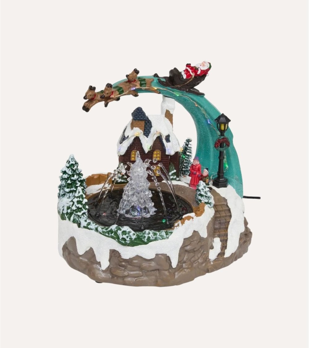 Escena Navideña de Fuente y Trineo con Agua, Luz y Música