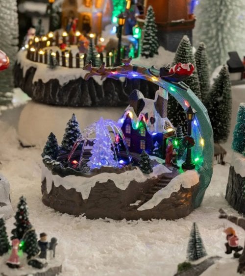 Escena Navideña de Fuente y Trineo con Agua, Luz y Música