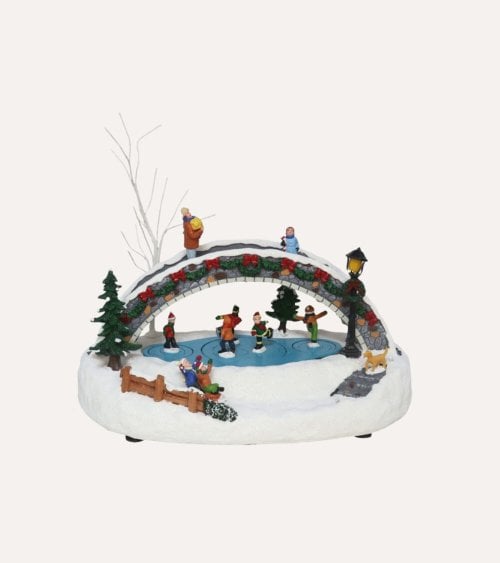 Escena Navideña de Patinaje Bajo el Puente con Movimiento